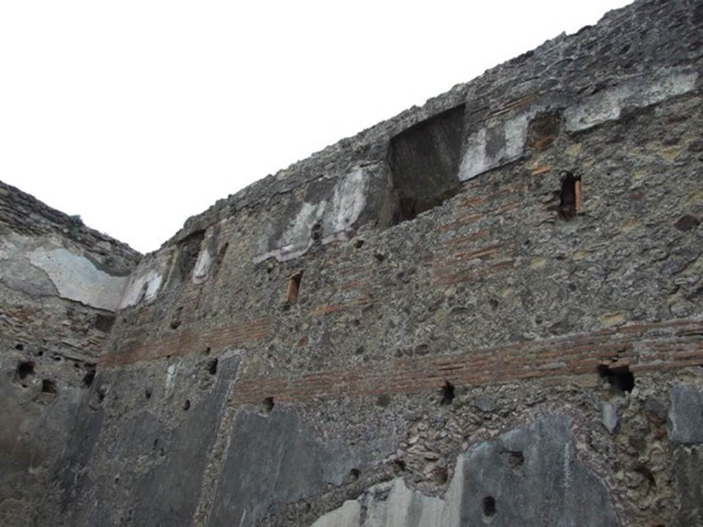 VII.1.8 Pompeii. December 2007. Room 8, womens baths anteroom, east wall showing upper floor.