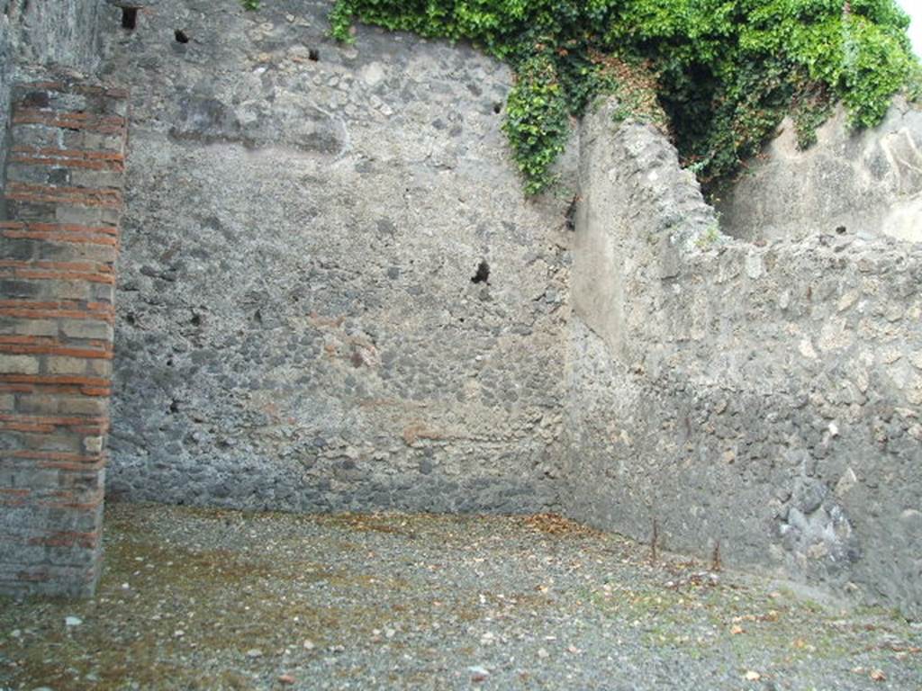 VII.1.16 Pompeii. May 2005. Looking west in workshop towards north-west corner.