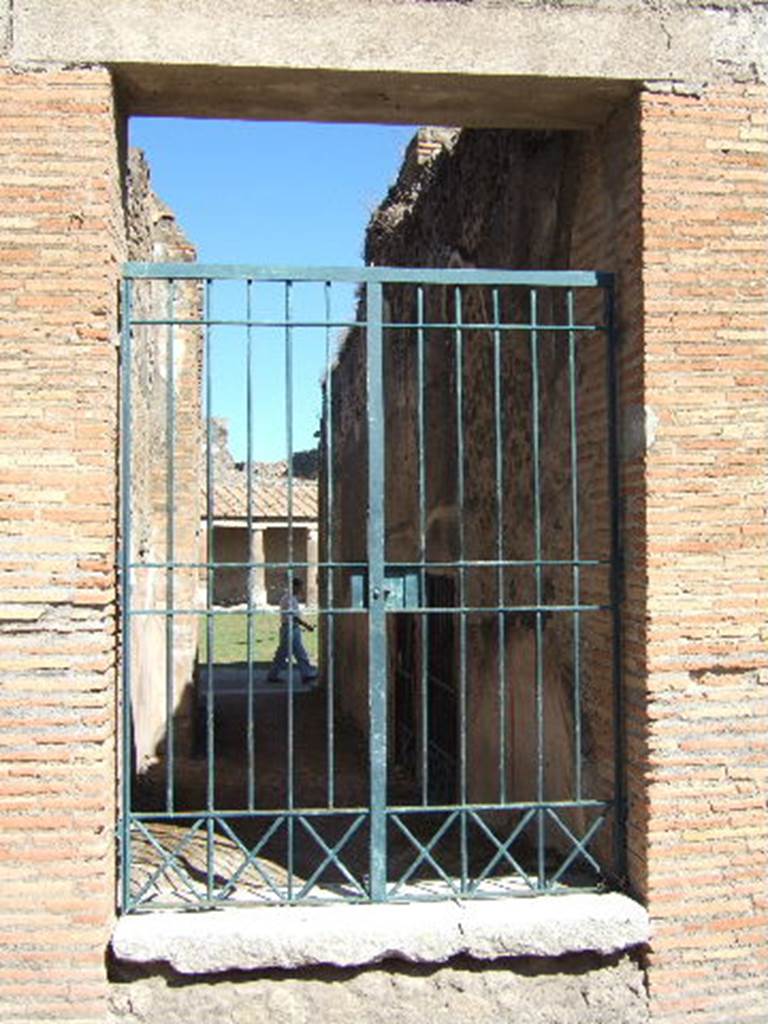 VII.1.51 Pompeii. September 2005. Looking east from entrance along corridor H towards gymnasium C of the baths.