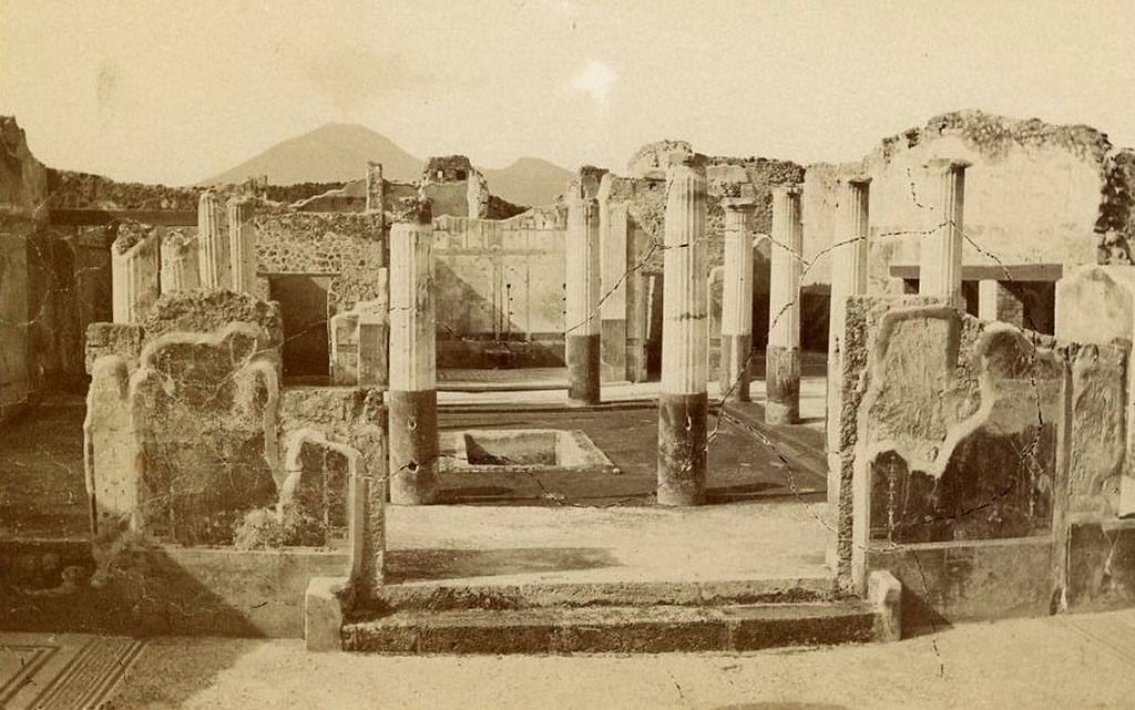 VII.7.5 Pompeii. (circa 1890). Looking north from atrium (b) across peristyle (l) to exedra (u).
On the left can be seen the north wall and flooring of west ala (e). Photo courtesy of Davide Peluso.