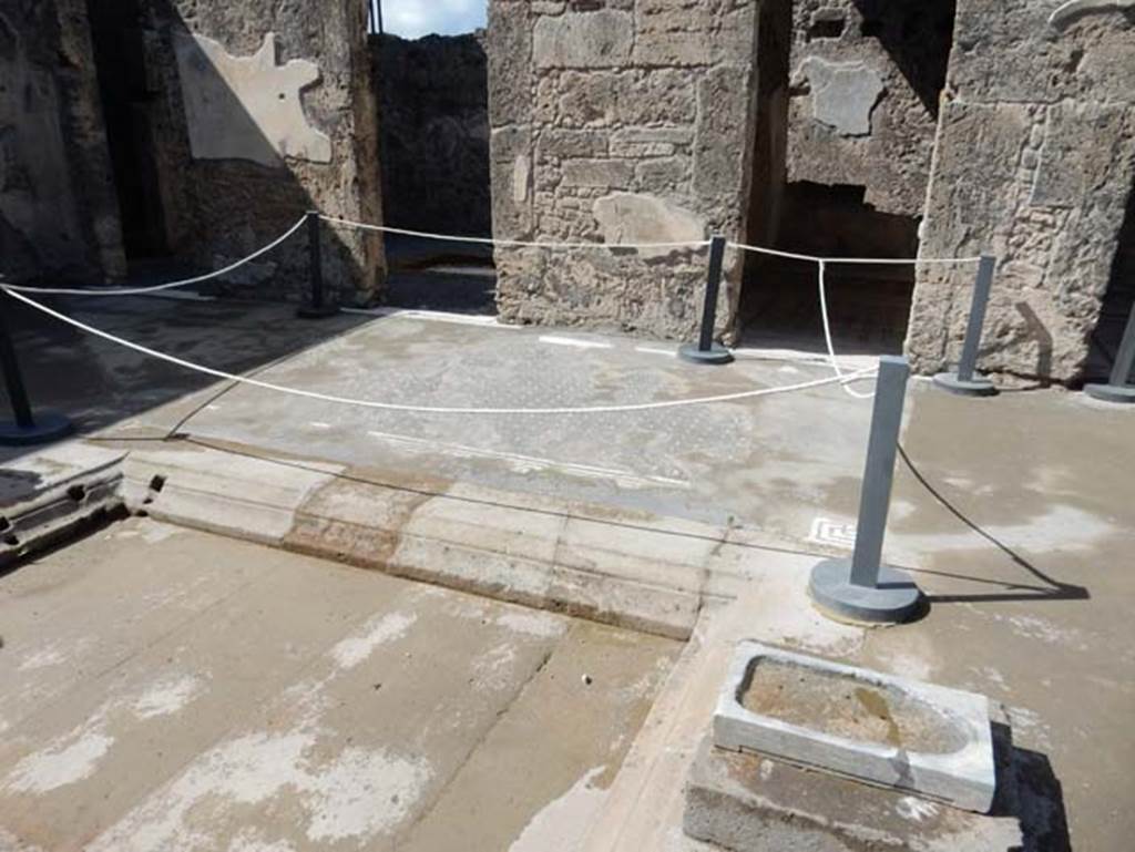 VII.15.2 Pompeii. May 2018. Doorways to rooms on west side of atrium.
On the extreme left are two doorways connecting to the atrium of VII.15.1, and on the right is a doorway to a cubiculum.
Seen on the pilaster, to the left, would have been “Summer”.
On the centre pilaster, but now completely devoid of plaster, would have been “Autumn”.
Photo courtesy of Buzz Ferebee.
According to PPM -
“Already in the excavation reports it was stated that one of the figures of the Seasons was completely destroyed, in particular “Autumn” was missing, which would have to have been found on the north side of the west wall between the doorways to the secondary atrium and the cubiculum.”
See Carratelli, G. P., 1990-2003. Pompei: Pitture e Mosaici: Vol. VII. Roma: Istituto della enciclopedia italiana, (p.714).