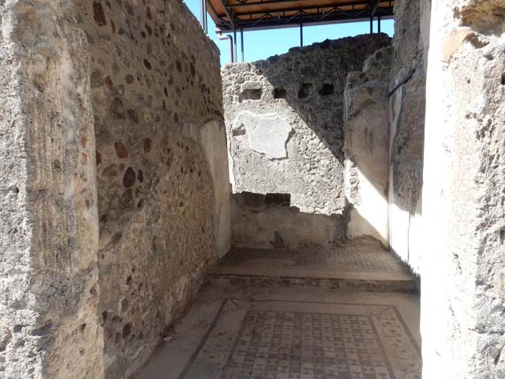 VII.15.2 Pompeii. May 2018. Looking west through doorway to cubiculum in north-west corner of atrium.
Photo courtesy of Buzz Ferebee.