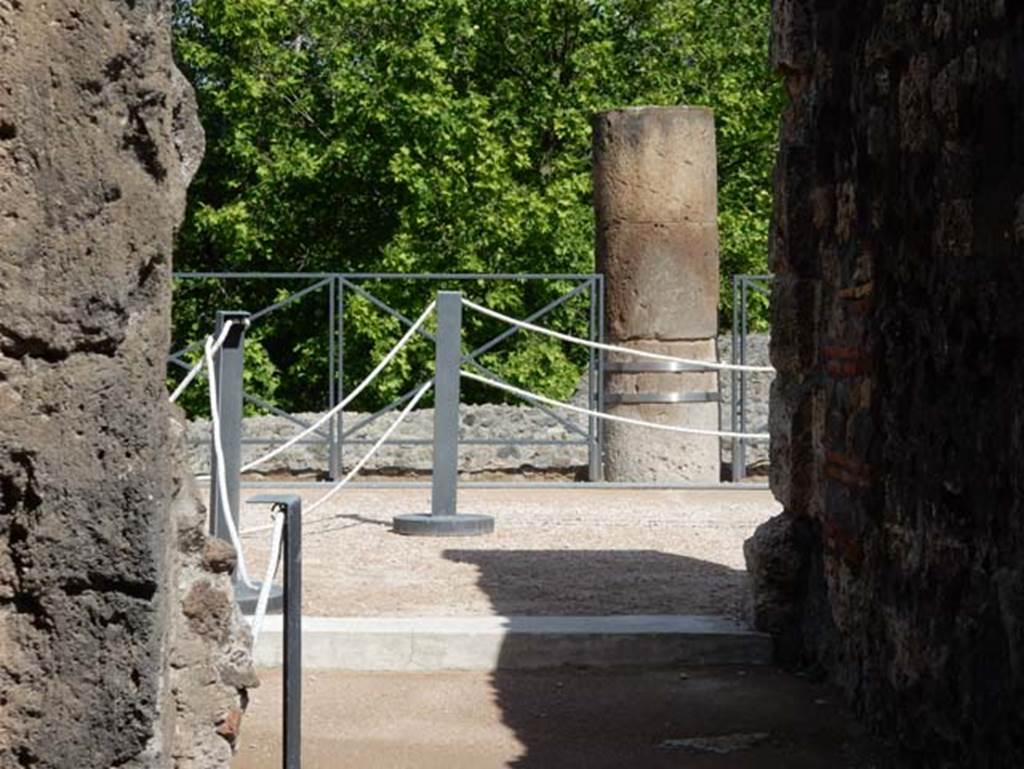 VII.15.2 Pompeii. May 2018. Looking through doorway towards west side of south portico overlooking the garden on a slightly lower level.. Photo courtesy of Buzz Ferebee.