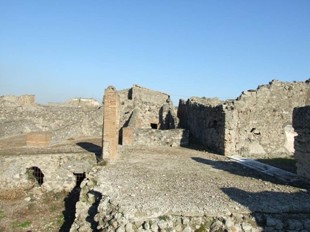 VII.15.2 Pompeii. December 2007.
Area to rear of Tablinum, looking east towards kitchen and baths area.