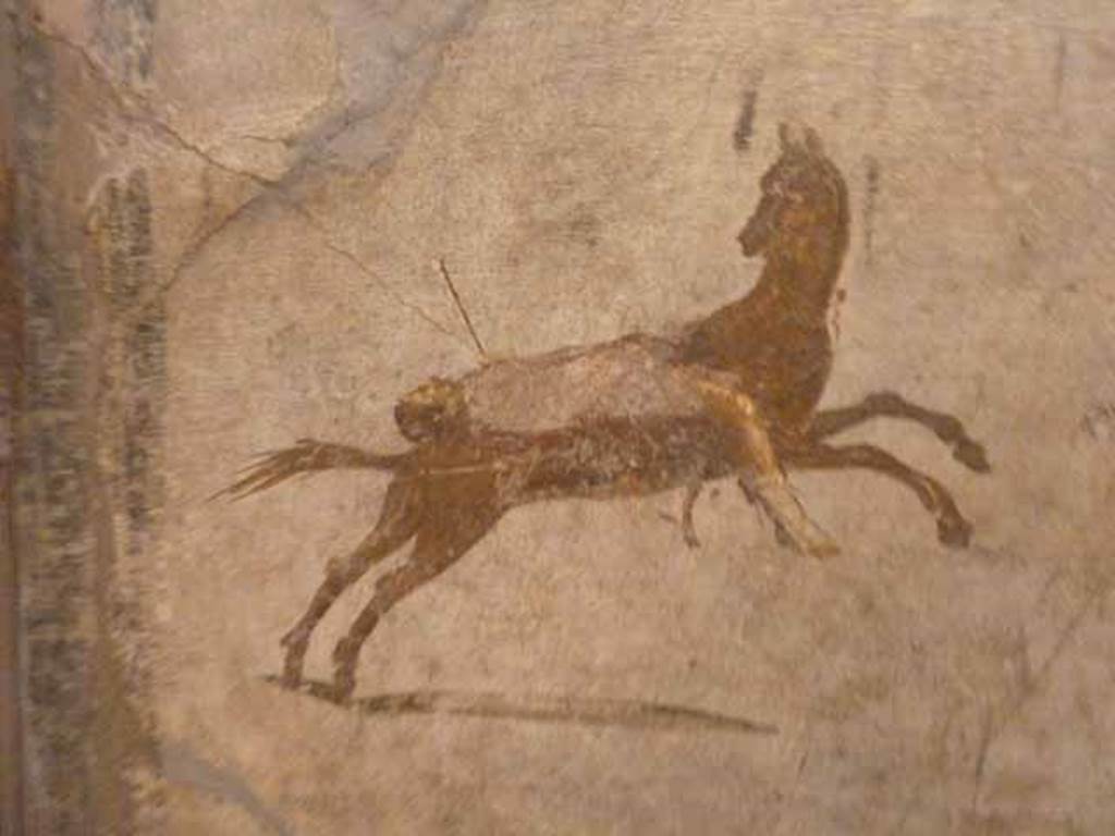 VII.15.2 Pompeii. May 2010. Detail from Slaughter of the Niobids from north wall of apodyterium. The children of Niobe are killed with poisoned arrows. Now in Naples Archaeological Museum. Inventory number 111479.