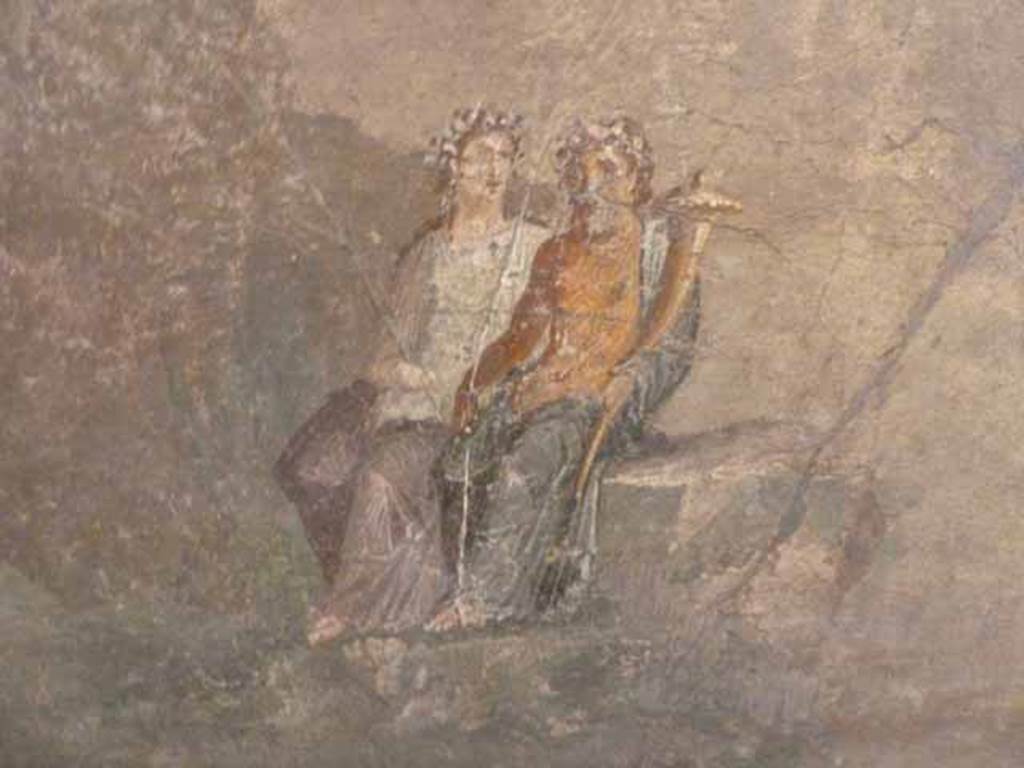 VII.15.2 Pompeii. May 2010. Detail from Slaughter of the Niobids from north wall of apodyterium/exedra.
Two figures sit in an attitude of complete indifference to what is happening.
The old man with a cornucopia may be the personification of the river Citerone.
The young girl may be the nymph Gargafia or Gargaphia.
Now in Naples Archaeological Museum. Inventory number 111479.
See Bragantini, I and Sampaolo, V., Eds, 2009. La Pittura Pompeiana. Verona: Electa. (p. 270, Fig 115).
See Sogliano, A., 1879. Le pitture murali campane scoverte negli anni 1867-79. Napoli: Giannini, p.85, no.505.