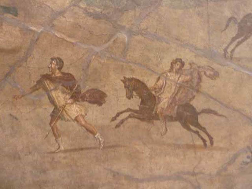 VII.15.2 Pompeii. May 2010. Detail from Slaughter of the Niobids from north wall of apodyterium. The sons of Niobe try to flee on foot or by horse but escape is futile. Now in Naples Archaeological Museum. Inventory number 111479.
