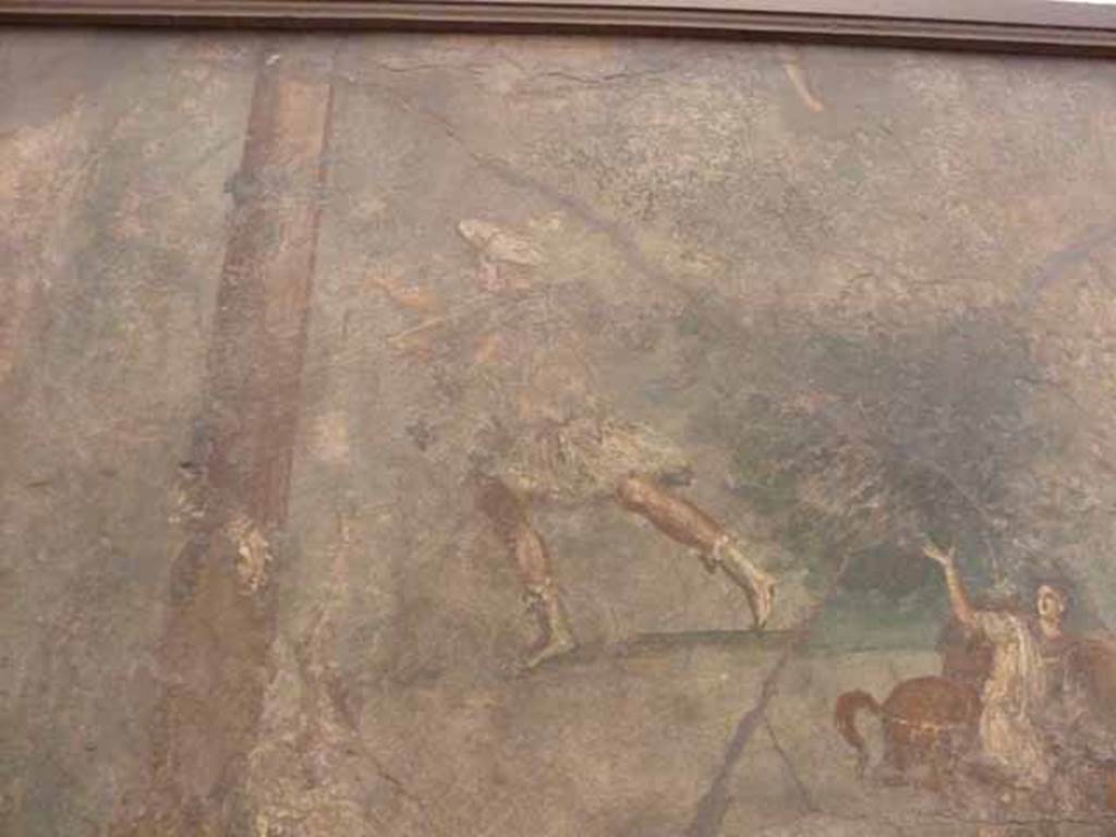 VII.15.2 Pompeii. May 2010. Detail from Slaughter of the Niobids from north wall of apodyterium. The leg at the top of the picture is that of Apollo. The servants, in short tunics and wearing hats, continue the hunt as if unaware of what is happening around them.
Now in Naples Archaeological Museum. Inventory number 111479. See Sogliano, A., 1879. Le pitture murali campane scoverte negli anni 1867-79. Napoli: Giannini. (p. 85, Item 505).