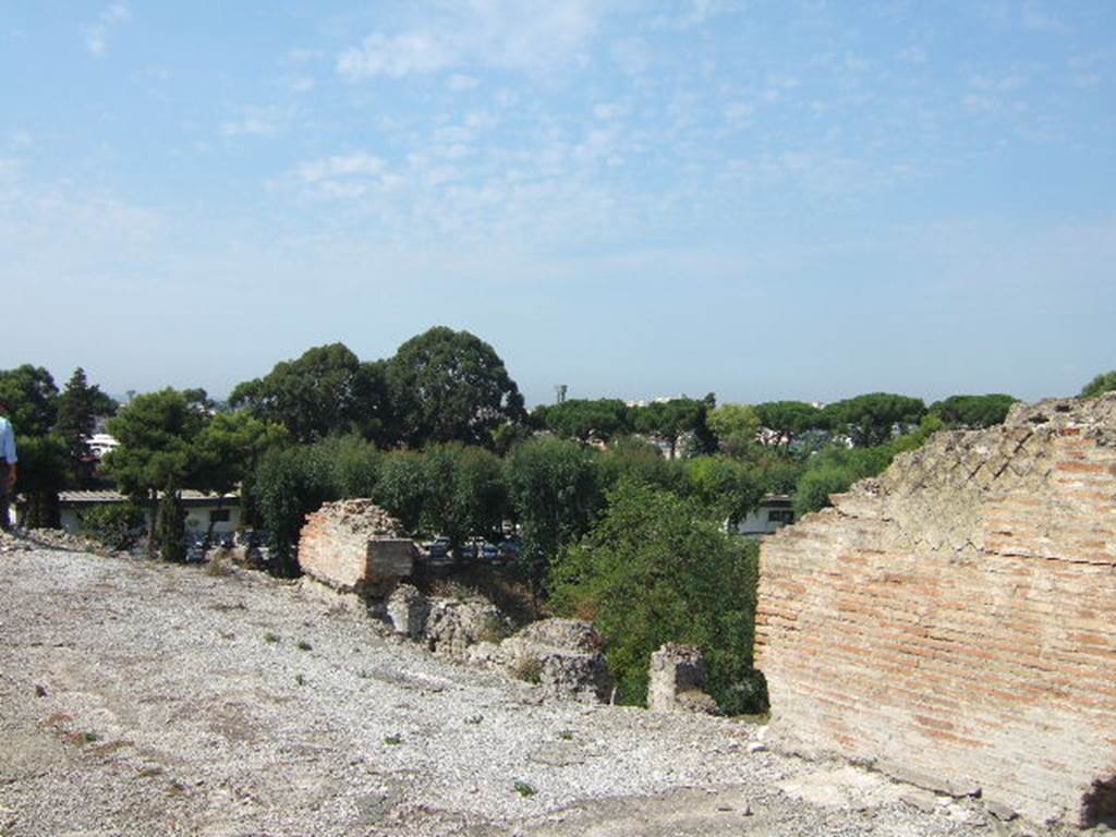 VII.16.15 Pompeii. September 2005. West end of north side of room 2, atrium. 
There are no rooms at this level on this side only a vertical drop to rooms on the lower level.
