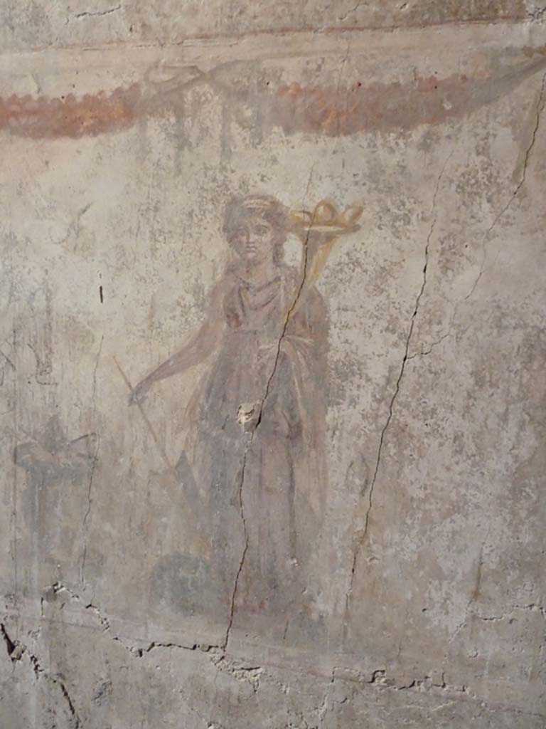 VII.16.a Pompeii. May 2010. Room 14, lararium on east wall.