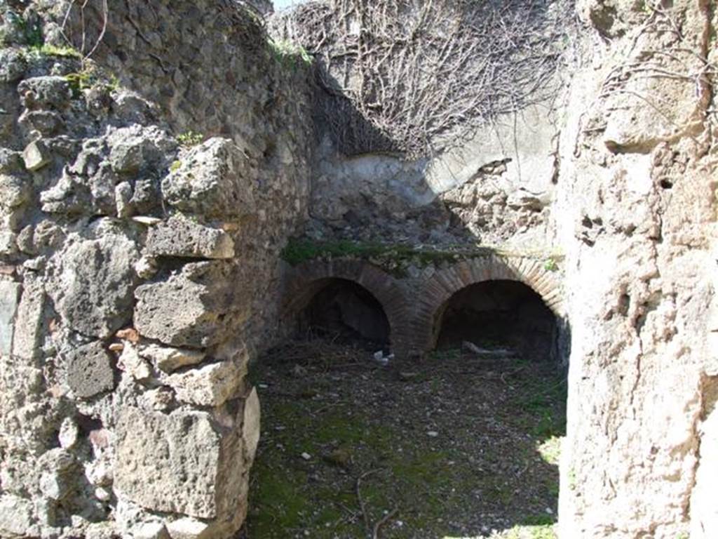 VIII.3.4 Pompeii.  March 2009. Doorway to Room 11.  Part of Services area, Kitchen?.