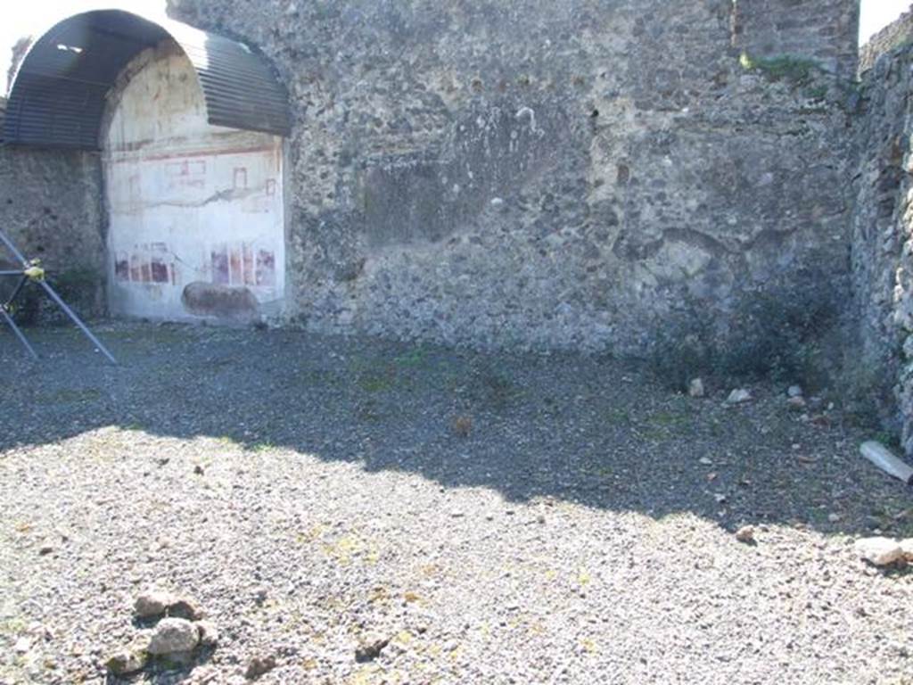 VIII.5.2 Pompeii. March 2009. Room 8, south-west corner of peristyle garden.
Originally there would have been another two rooms butting onto the south wall of the peristyle garden, on the west side of the oecus with the painted south wall, seen on left above.
