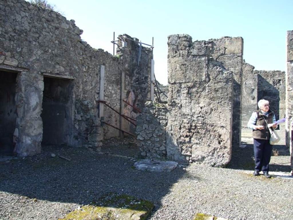 VIII.5.5 Pompeii.  March 2009. Room 25.  Atrium, looking south west to Doorways to Rooms 31, 27, 26 and 23.