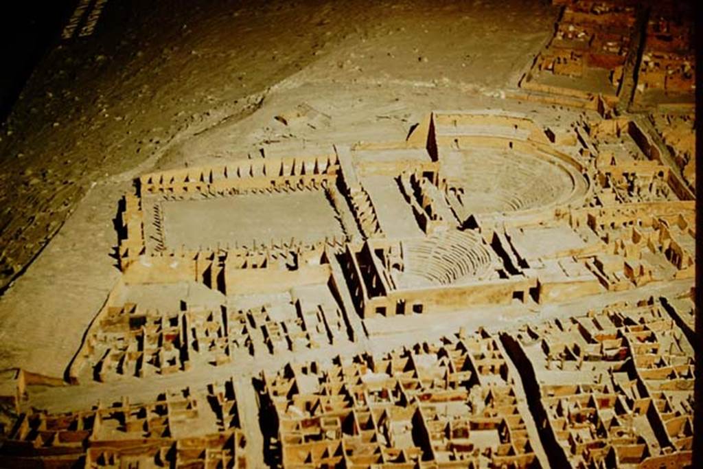 VIII.7.16 Gladiators Barracks, with Theatres to the right of centre, Looking west across I.1, and I.2 across Via Stabiana towards VIII.7. 1957. Looking west across model in Naples Museum. Photo by Stanley A. Jashemski.
Source: The Wilhelmina and Stanley A. Jashemski archive in the University of Maryland Library, Special Collections (See collection page) and made available under the Creative Commons Attribution-Non Commercial License v.4. See Licence and use details. J57f0555