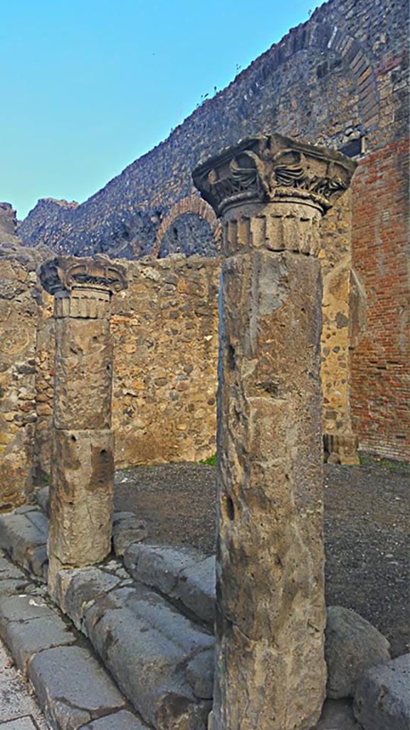 VIII.7.16 Pompeii. 2015/2016.
Steps and columns in north-east corner. Photo courtesy of Giuseppe Ciaramella.