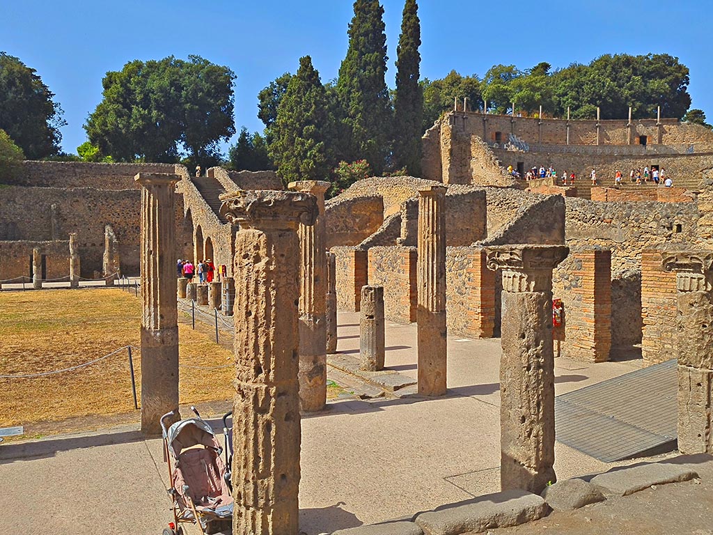 VIII.7.16 Pompeii. September 2024.
Looking north-west towards the large theatre, from north-east corner. Photo courtesy of Giuseppe Ciaramella.