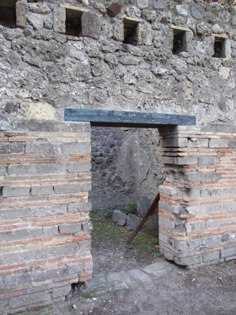 VIII.7.16 Pompeii. December 2007. Room on west side. Mau identifies this as a guard room. A set of stocks for confining prisoners was found here.
The skeletons of four persons who were not locked in the stocks at the time of the eruption were found here. See Mau, A., 1907, translated by Kelsey F. W. Pompeii: Its Life and Art. New York: Macmillan. (p.163).