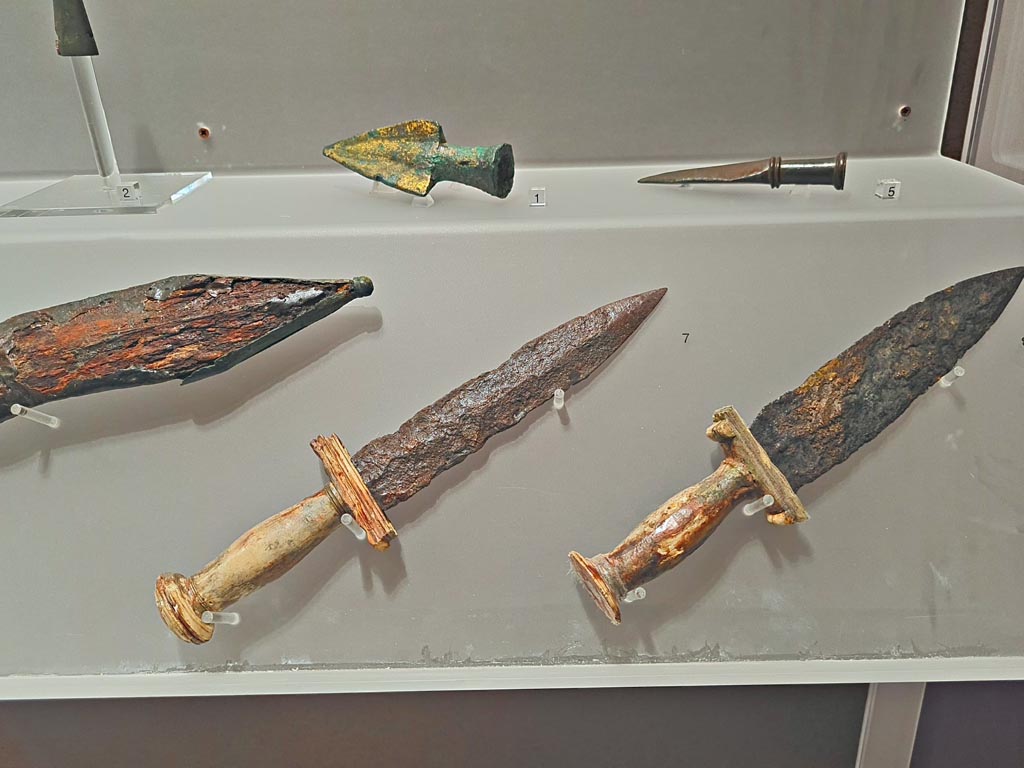 VIII.7.16 Pompeii. Details of daggers. Photo taken May 2021, courtesy of Giuseppe Ciaramella.