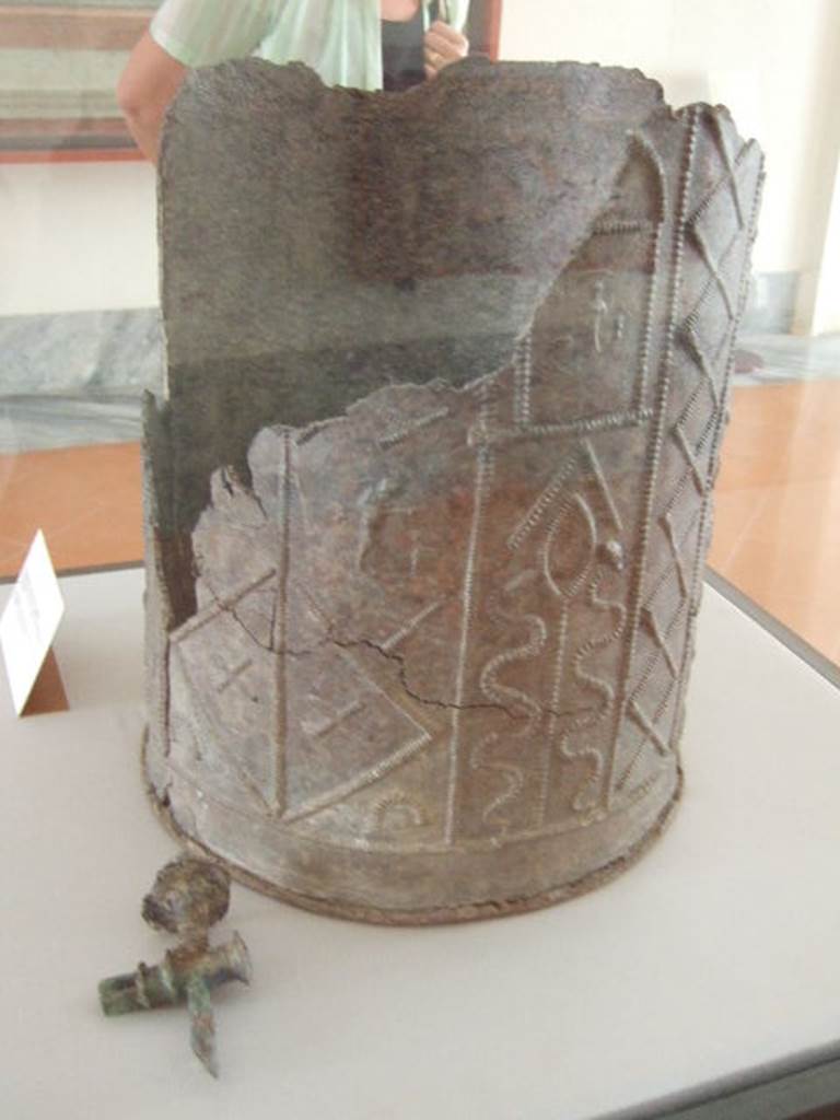 VIII.7.28 Pompeii.  Water container decorated with themes of Isis.  
Found in the north-east corner of the portico.  Now in Naples Archaeological Museum.
