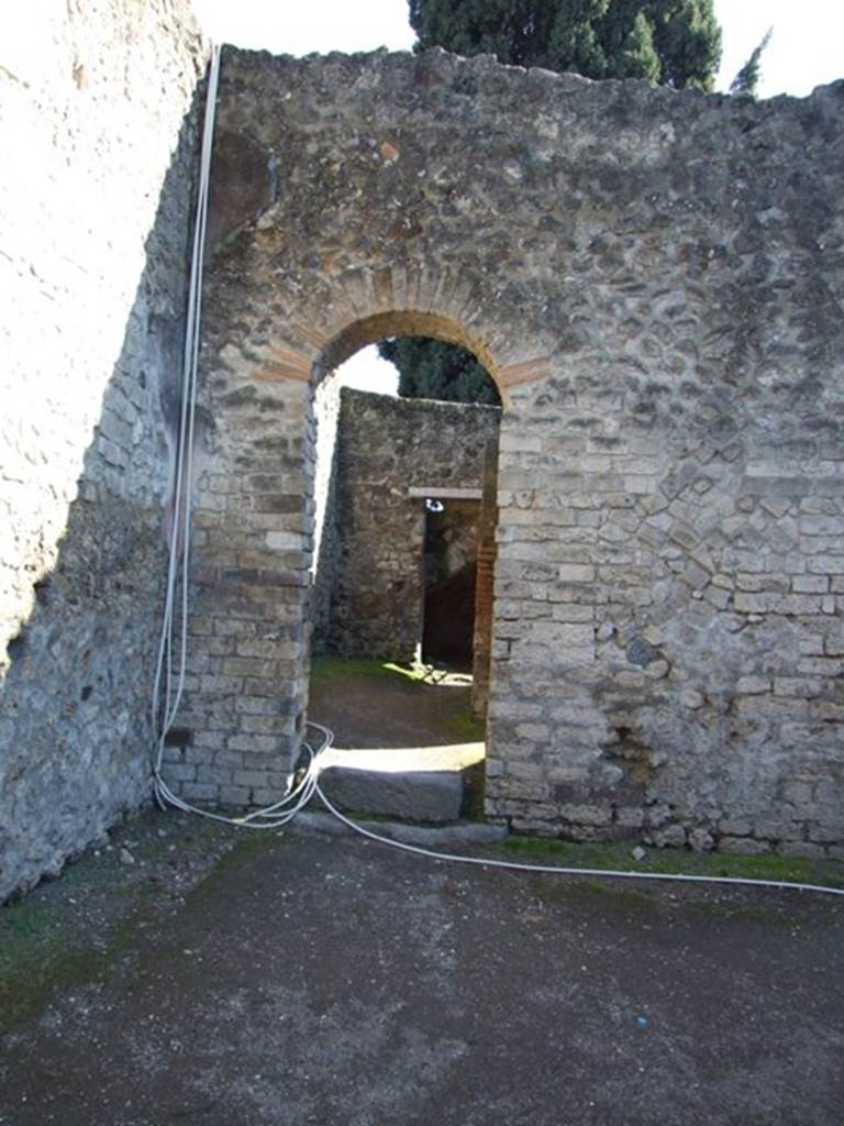 VIII.7.28 Pompeii. March 2009. South portico, doorway to the Priest’s kitchen.