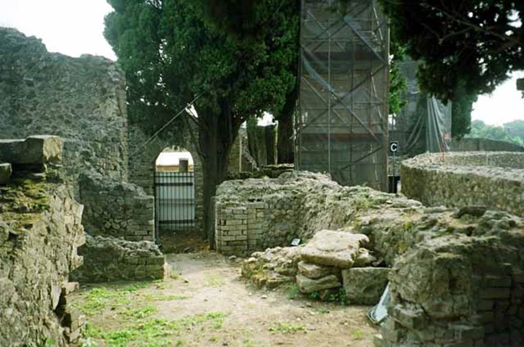 VIII.7.28 Pompeii. July 2010. Irregular shaped sacred room. Looking east from west end. This room is entered through the arched entrance in the south west corner of the colonnade. Mau refers to it as a sacred room and as the Hal of Initiation. See Mau, A., 1907, translated by Kelsey F. W. Pompeii: Its Life and Art. New York: Macmillan. Page 170 and 181. Photo courtesy of Rick Bauer.