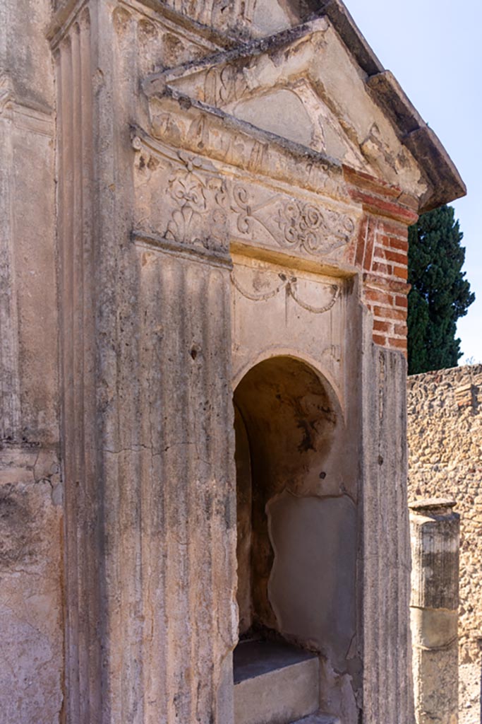 VIII.7.28 Pompeii. October 2023. 
Detail of niche at north end of cella of Temple. Photo courtesy of Johannes Eber.
