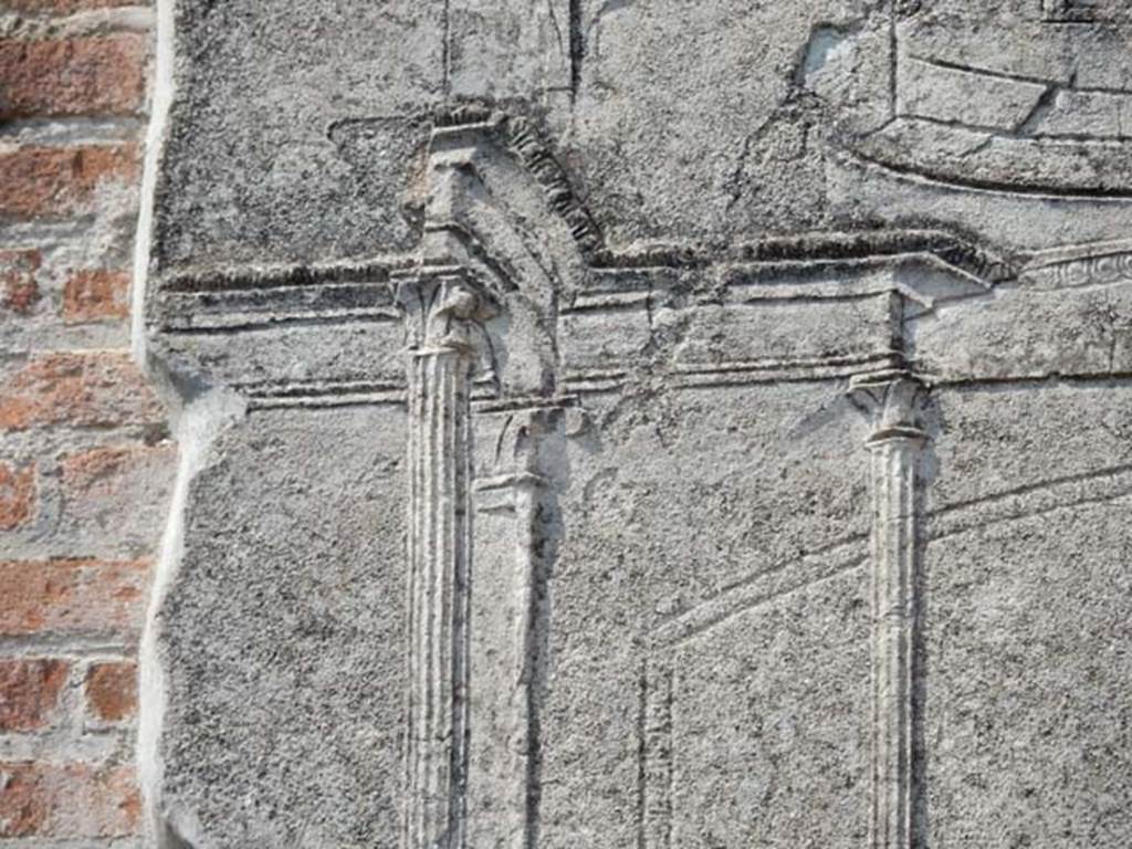 VIII.7.28, Pompeii. May 2015. Detail of decorative stucco on north side of doorway.
Photo courtesy of Buzz Ferebee.
