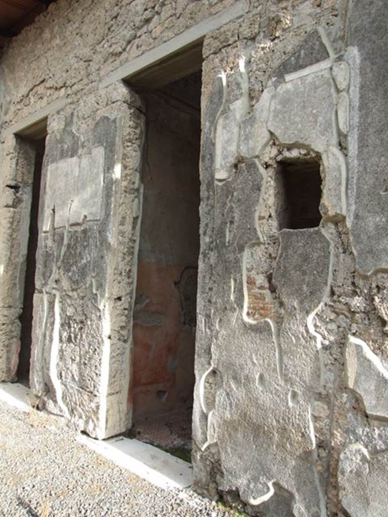 IX.1.20 Pompeii. December 2007. Doorway to Room 7 and window in atrium.