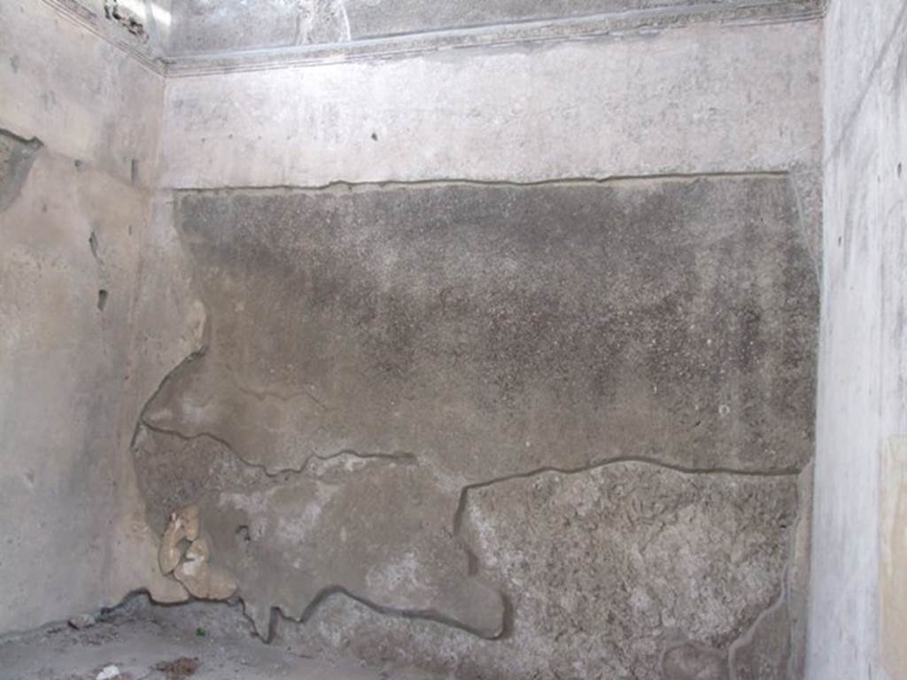 IX.1.20 Pompeii. December 2007. Room 9, remains of wall painting on east wall. Mau states the painting in the centre of the east Wall, seems to relate to Apollo but the subject has not been explained. See Mau, A., 1907, translated by Kelsey F. W. Pompeii: Its Life and Art. New York: Macmillan. (p.312).