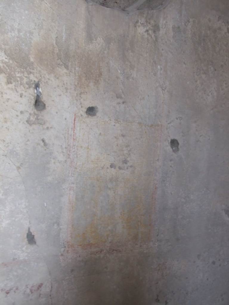 IX.1.20 Pompeii. December 2007. Room 9, remains of wall painting of light architectural framework on a white background separating panels on north wall.