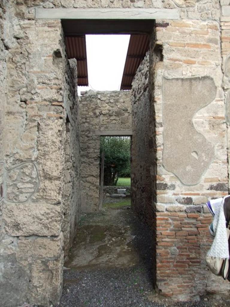 IX.1.20 Pompeii. December 2007. Room 11. Passage from atrium to Garden and kitchen area.