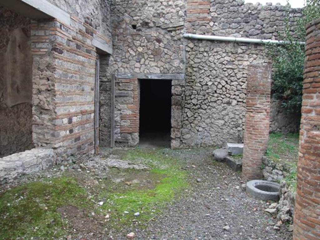 IX.1.20 Pompeii. December 2007. Room 12. Garden area. Looking west past Tablinum window to kitchen area.