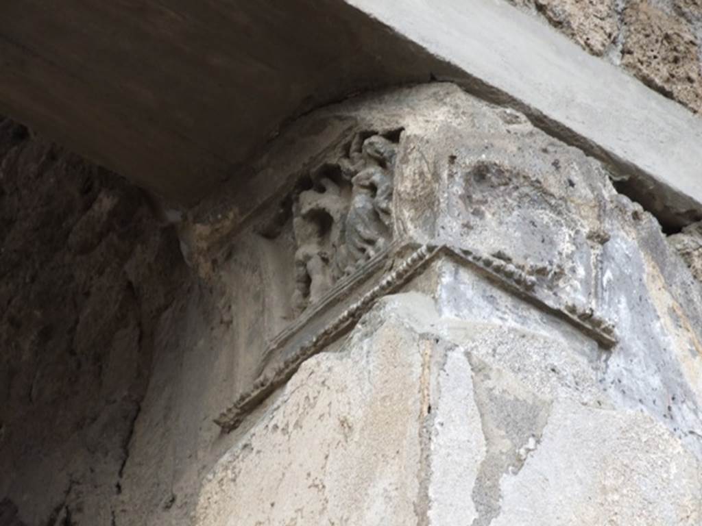 IX.1.20 Pompeii. December 2007. Room 2 Atrium, West Side. Damaged front face of capital from north western corner.