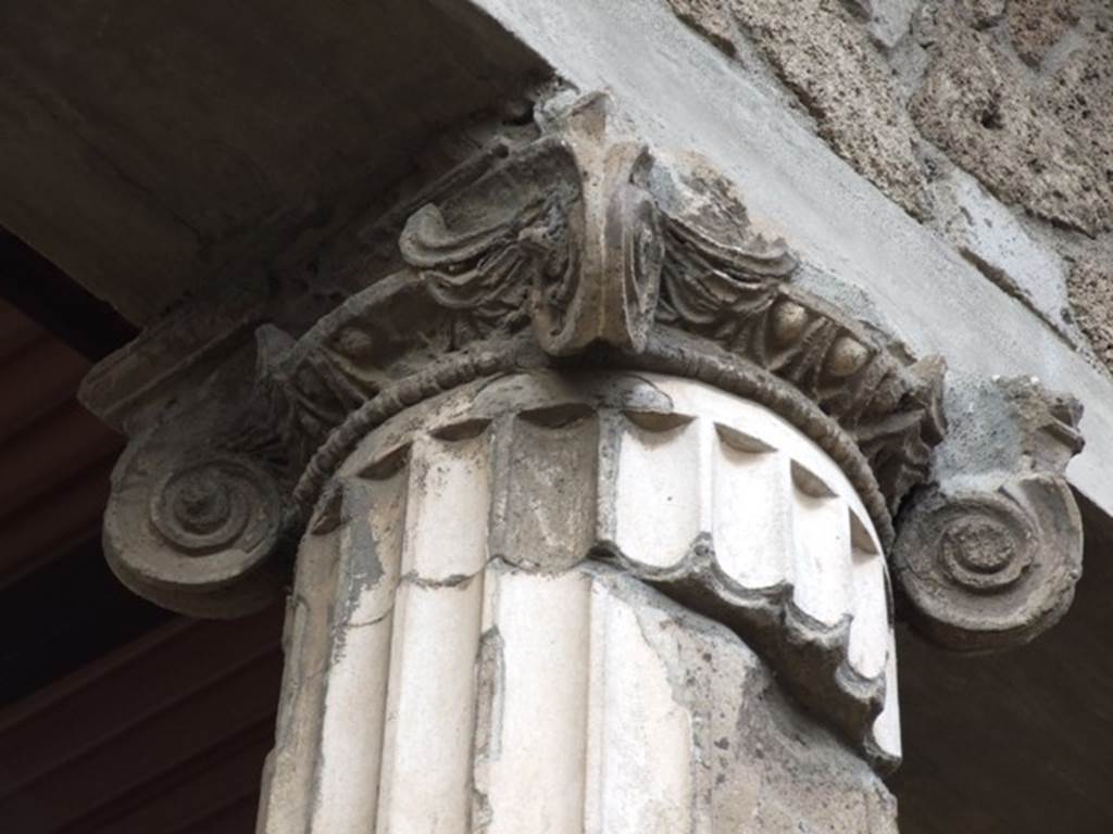 IX.1.20 Pompeii. December 2007. Room 2 West Side. Capital on Ionic column.
