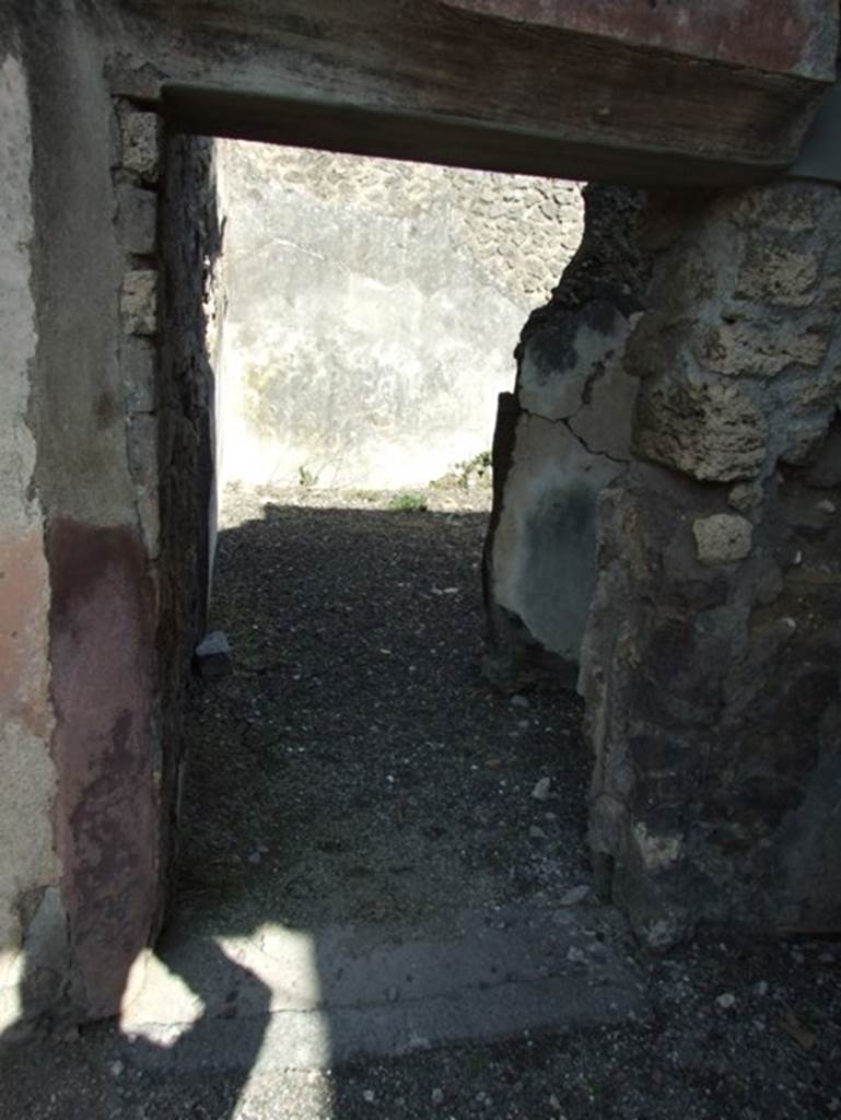 IX.2.16 Pompeii.  March 2009.  Doorway to oecus in south east corner of atrium.