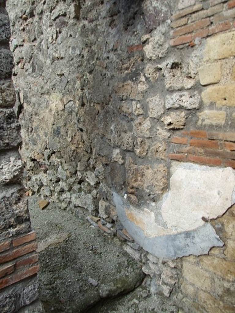 IX.3.15 Pompeii. March 2009. Room 5, small doorway with steps to room 6, in north-east corner.  