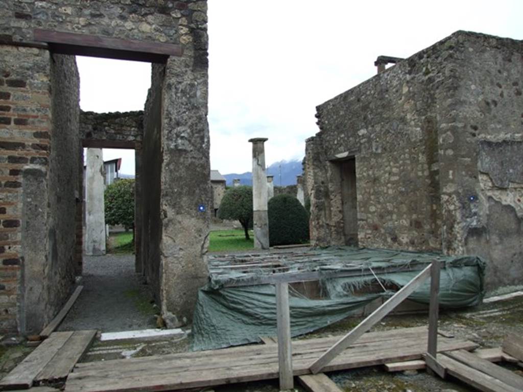 IX.8.6 Pompeii. March 2009.  Room 10, Corridor, and Room 9, Tablinum.  Looking south to peristyle.