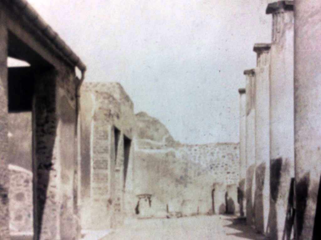 IX.8.6 Pompeii. c.1920’s. Looking east across north portico, with doorway to room 11, centre right. Photo courtesy of Rick Bauer.