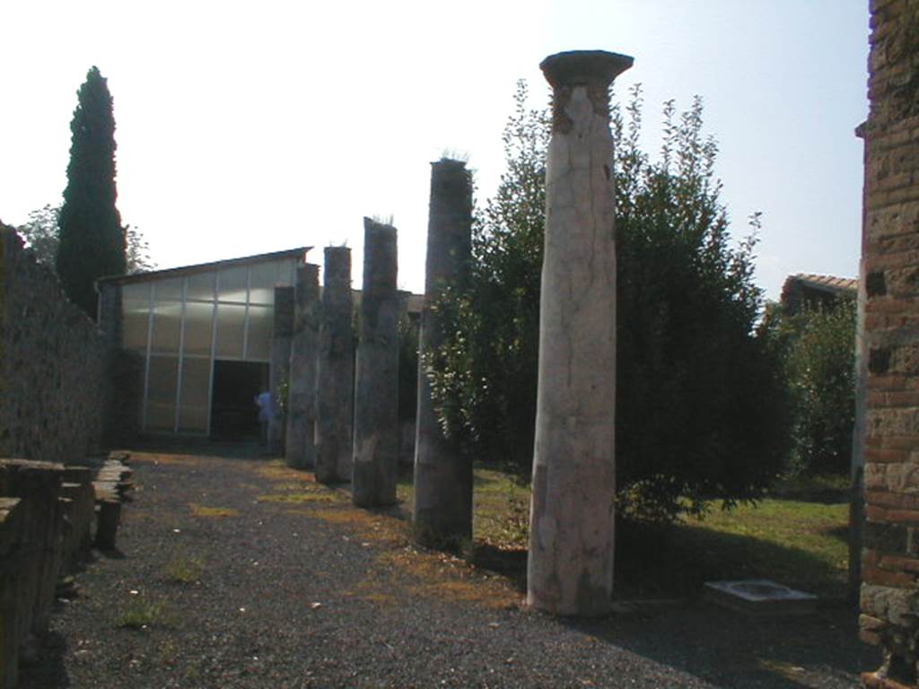 IX.8.6 Pompeii.  September 2004.  East side of Peristyle looking south.
