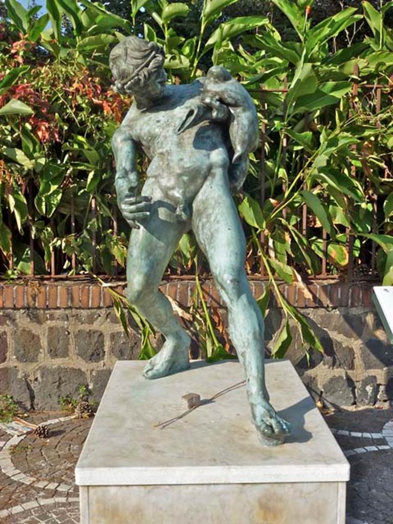 IX.8.6 Pompeii. October 2012. Modern copy of satyr with wineskin, displayed on the Via Plinio in modern Pompeii. Photo courtesy of Michael Binns.
