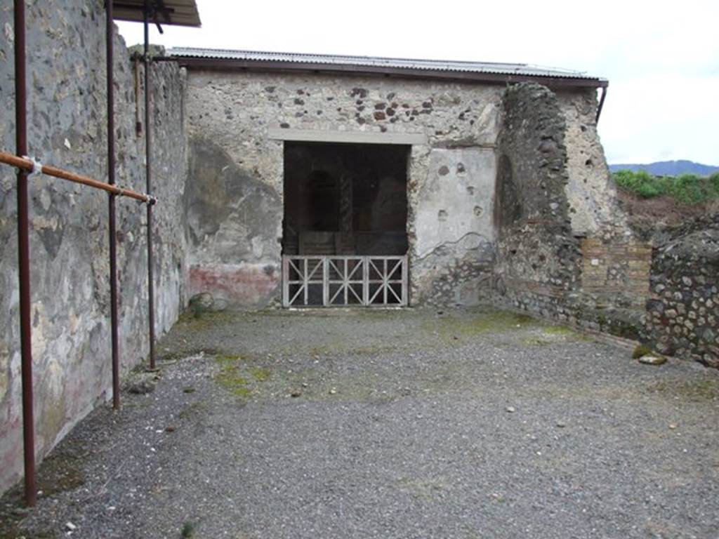 IX.8.6 Pompeii. March 2009.  Room 14, Large Triclinium, with Doorway to Nymphaeum in south wall.