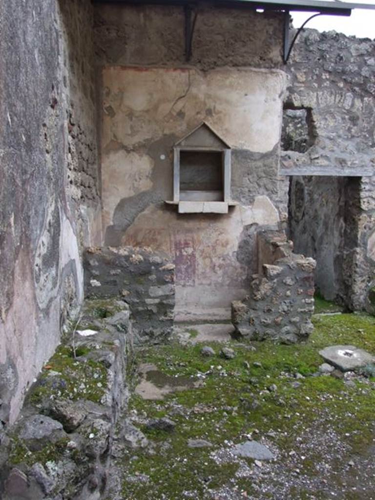 IX.8.6 Pompeii. March 2009.  Room 23, Lararium in south east corner of Room 22, Atrium of servants quarters.

