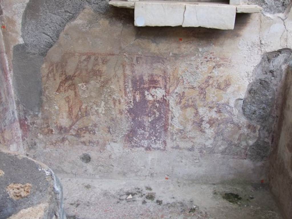 IX.8.6 Pompeii. March 2009.  Room 23.  Remains of painted plaster under niche on south wall.
