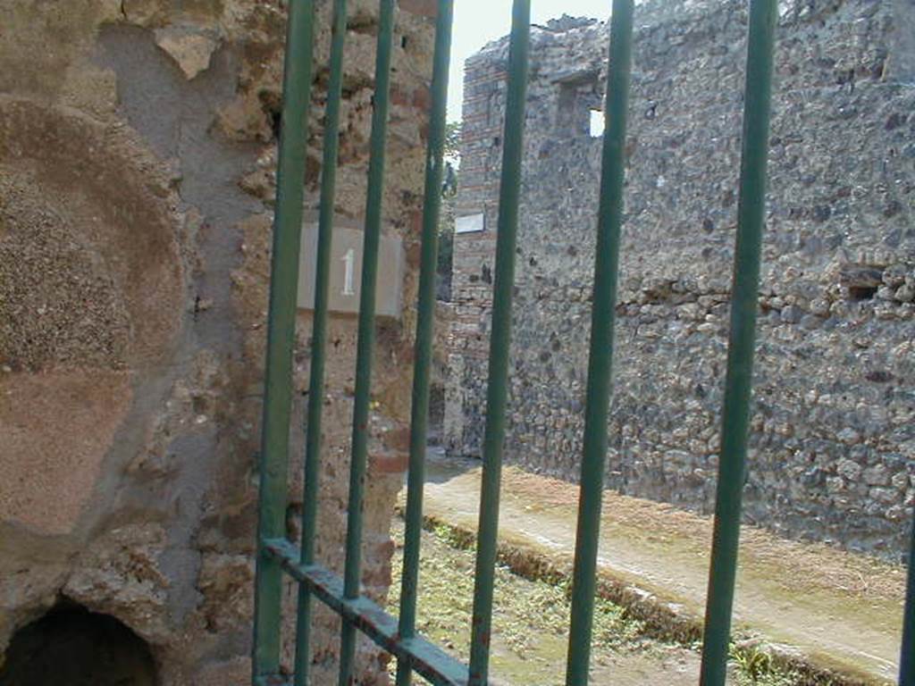 Looking out from IX.8.6 to Vico del Centenario.  September 2004.  (Door shown on map as IX.8.a – but possibly renumbered to IX.8.11?)


