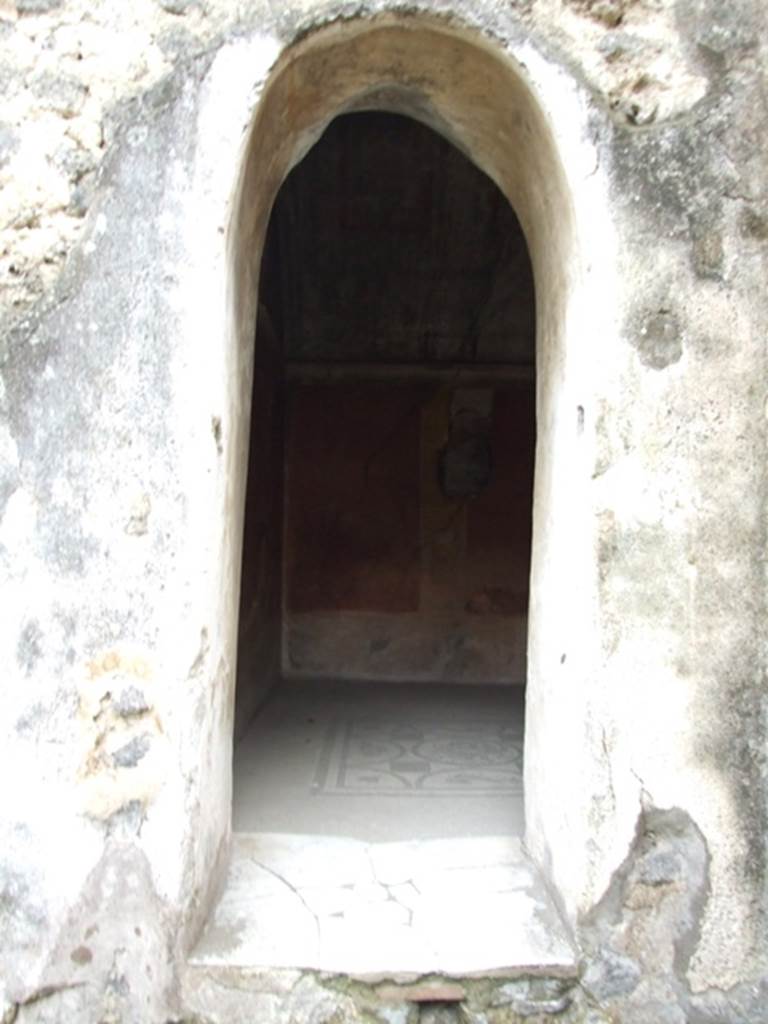 IX.8.6 Pompeii. March 2009. Room 32, south wall with arched doorway to room 33, tepidarium.
