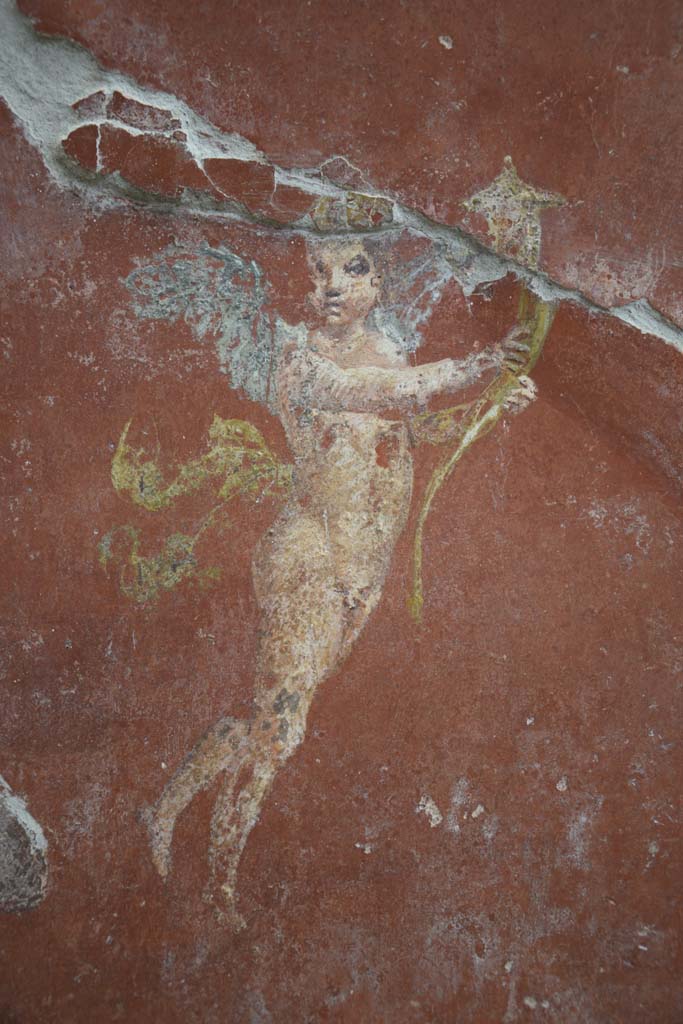IX.12.6 Pompeii. February 2017.
Room “m”, detail of flying figures from east wall, on north side of central painting.
Photo courtesy of Johannes Eber.