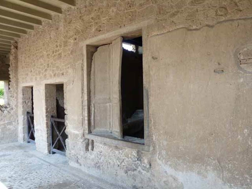 Villa of Mysteries, Pompeii. May 2010. Looking north along portico P3, with doorways to rooms 13 and 12 and window of room 11.