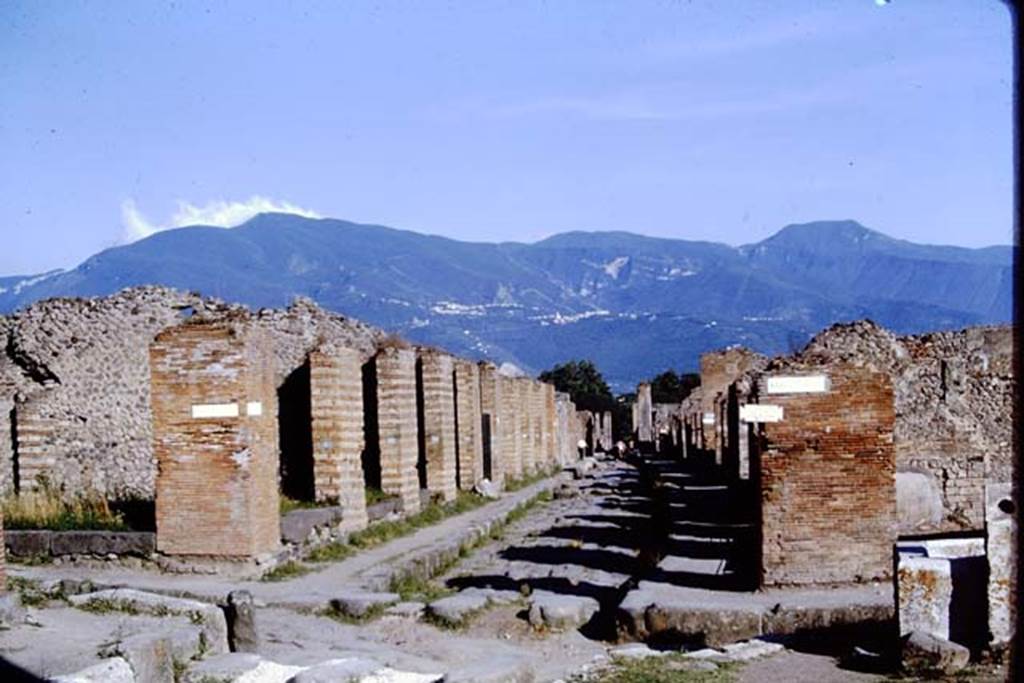 Via Stabiana, Pompeii. 1966. Looking south from the crossroads, with Via di Nola (on left) and Via della Fortuna (on right). Photo by Stanley A. Jashemski.
Source: The Wilhelmina and Stanley A. Jashemski archive in the University of Maryland Library, Special Collections (See collection page) and made available under the Creative Commons Attribution-Non Commercial License v.4. See Licence and use details.
J66f0333