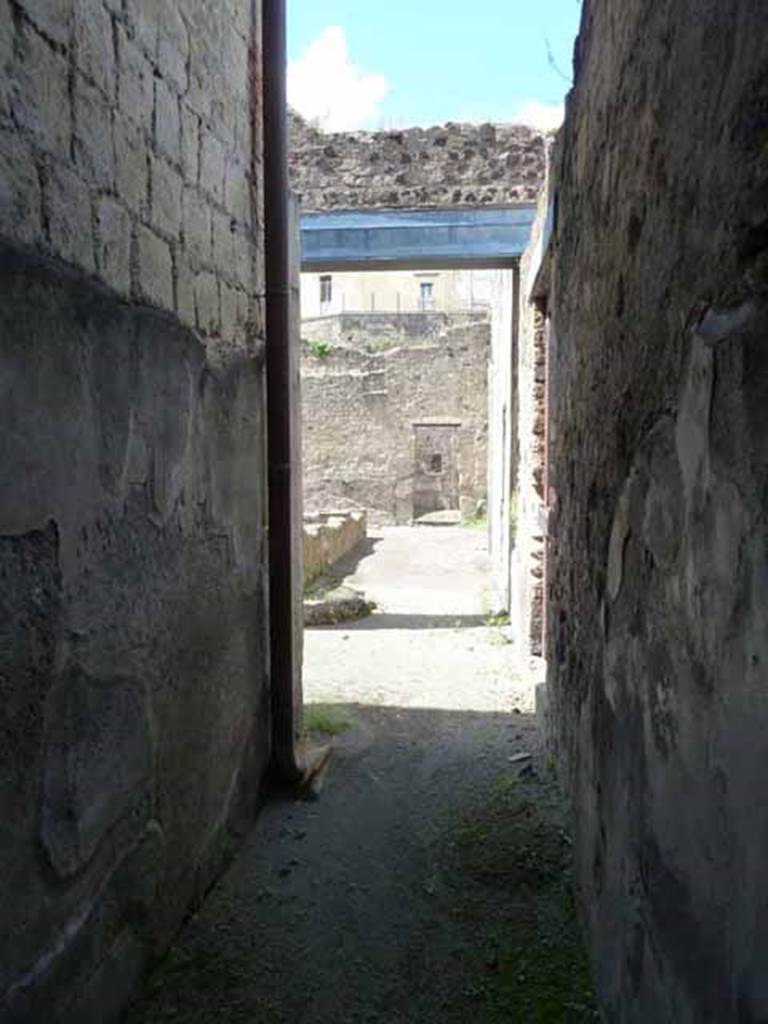 III.11 Herculaneum. May 2010. Looking west along corridor 10.