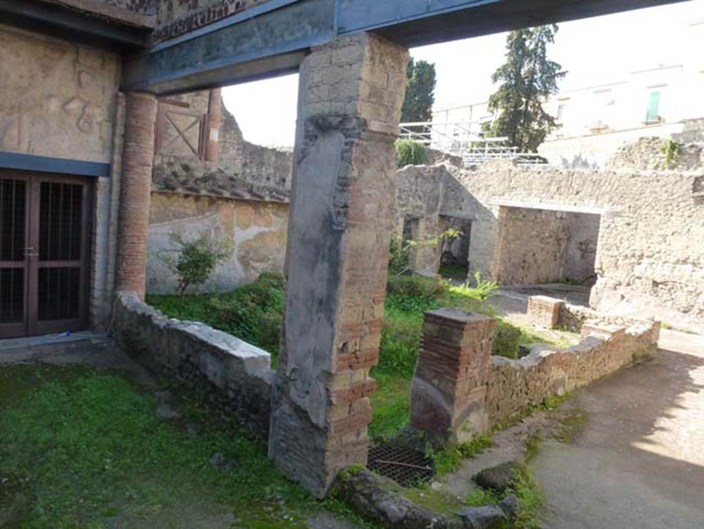 III.11/8 Herculaneum. October 2012. Looking south-west across peristyle garden towards doorways to room 14 to room 16.  Photo courtesy of Michael Binns.
